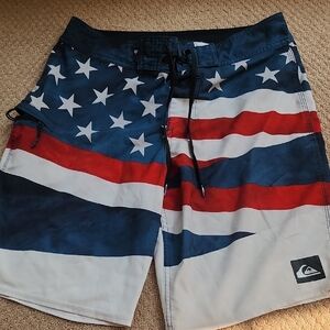 Quiksilver Red and White Board Shorts with Wave Pattern